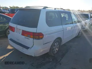 2002 Honda Odyssey EX z VIN 2HKRL18602H522128, wystawiony jako IAAI lot #40879648 z przebiegiem Nie podano mil oraz . Historia ofert i sprzedaży dostępna na DreamBid. Obrazek 4.