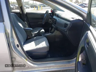 2014 Toyota Corolla L with VIN 2T1BURHE5EC006925, listed as a IAAI auction lot 40917569 with 130,761 mi miles and . Bid and sale history available at DreamBid. Image 5.