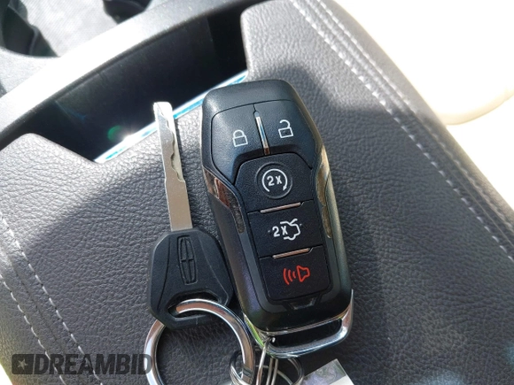 2014 Lincoln MKZ with VIN 3LN6L2G91ER832211, listed as a IAAI auction lot 41770905 with 63,417 mi miles and . Bid and sale history available at DreamBid. Image 11.