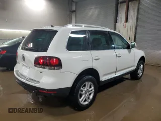 2008 Volkswagen Touareg V6 с VIN WVGBE77L18D001404, выставлен на аукционе Copart как лот 51045355 с пробегом 120 082 миль миль и Списание • Salvage title. История ставок и продаж доступна на DreamBid. Изображение 3.