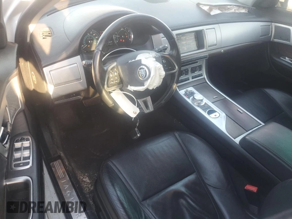 2013 Jaguar XF SC with VIN SAJWJ0EF3D8U08568, listed as a Copart auction lot 51001015 with 131,108 mi miles and Salvage Title. Bid and sale history available at DreamBid. Image 8.