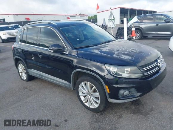 2012 Volkswagen Tiguan SE z VIN WVGAV7AX7CW504391, wystawiony jako IAAI lot #42240604 z przebiegiem 180 330 mil mil oraz . Historia ofert i sprzedaży dostępna na DreamBid. Obrazek 1.