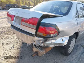 2002 Honda Accord LX with VIN 3HGCG564X2G703511, listed as a IAAI auction lot 41861622 with 266,533 mi miles and . Bid and sale history available at DreamBid. Image 6.