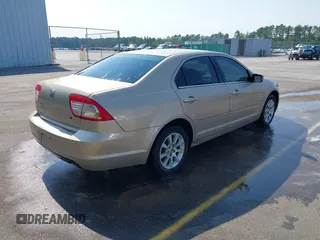 2006 Mercury Milan with VIN 3MEHM07116R633281, listed as a IAAI auction lot 42393137 with 102,806 mi miles and . Bid and sale history available at DreamBid. Image 4.