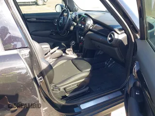 2015 MINI Hardtop 4 Door S z VIN WMWXU3C58F2B57218, wystawiony jako IAAI lot #42361437 z przebiegiem 96 984 mil mil oraz . Historia ofert i sprzedaży dostępna na DreamBid. Obrazek 5.