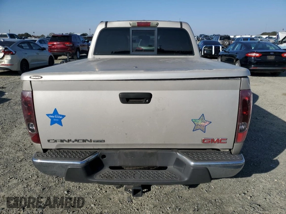 2005 GMC Canyon 1SE SLE Z71 with VIN 1GTDS136558111377, listed as a Copart auction lot 80158764 with 315,756 mi miles and Salvage Title. Bid and sale history available at carsss.com. Image 6.
