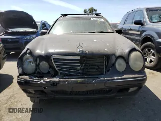 2001 Mercedes-Benz E-Class AWD with VIN WDBJH82J71X051634, listed as a Copart auction lot 51299544 with 286,211 mi miles and Salvage Title. Bid and sale history available at carsss.com. Image 5.