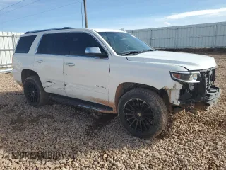 2018 Chevrolet Tahoe Premier with VIN 1GNSKCKC5JR196310, listed as a Copart auction lot 48050205 with 101,300 mi miles and Salvage title. Bid and sale history available at DreamBid. Image 4.