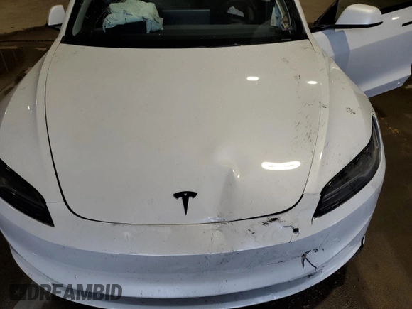 2025 Tesla Model 3 Long Range z VIN 5YJ3E1EBXSF942561, wystawiony jako Copart lot #52961935 z przebiegiem 5 911 mil mil oraz Szkoda całkowita • Salvage title. Historia ofert i sprzedaży dostępna na DreamBid. Obrazek 11.
