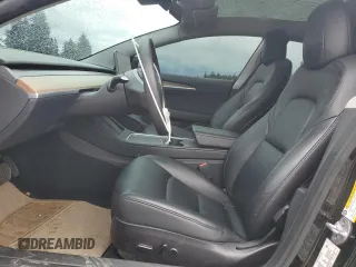 2023 Tesla Model 3 with VIN 5YJ3E1EA2PF457667, listed as a Copart auction lot 57360035 with 53,962 mi miles and Salvage title. Bid and sale history available at DreamBid. Image 7.