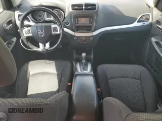 2013 Dodge Journey SE with VIN 3C4PDCAB3DT699816, listed as a Copart auction lot 52856455 with 67,688 mi miles and Salvage Title. Bid and sale history available at carsss.com. Image 8.