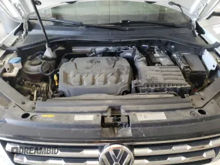 2018 Volkswagen Tiguan S with VIN 3VV1B7AX4JM118670, listed as a Copart auction lot 57055935 with 104,443 mi miles and Salvage title. Bid and sale history available at DreamBid. Image 12.