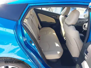 2021 Toyota Prius L Eco with VIN JTDKAMFU9M3135117, listed as a IAAI auction lot 41579736 with 35,795 mi miles and . Bid and sale history available at DreamBid. Image 8.