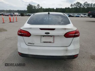 2018 Ford Focus S with VIN 1FADP3E25JL307761, listed as a Copart auction lot 52983485 with 113,217 mi miles and Clean Title. Bid and sale history available at carsss.com. Image 6.