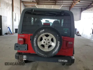 2000 Jeep Wrangler Sport with VIN 1J4FA49S9YP751596, listed as a Copart auction lot 52527315 with 132,514 mi miles and Clean Title. Bid and sale history available at carsss.com. Image 6.