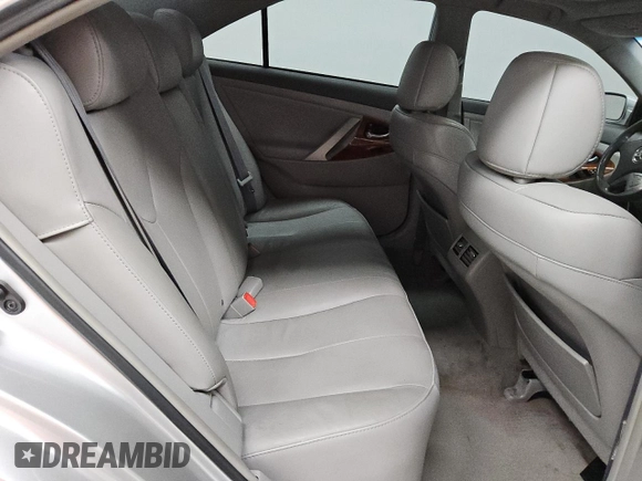 2009 Toyota Camry LE z VIN 4T1BK46K89U595880, wystawiony jako Copart lot #55069935 z przebiegiem 265 831 mil mil oraz Czysty tytuł • Clean title. Historia ofert i sprzedaży dostępna na DreamBid. Obrazek 10.