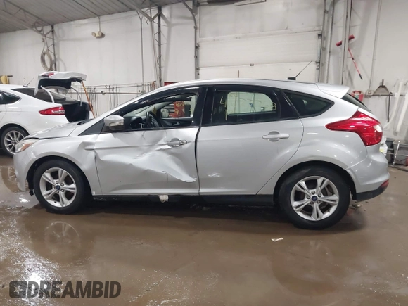2014 Ford Focus SE with VIN 1FADP3K28EL424177, listed as a IAAI auction lot 41677768 with 104,279 mi miles. Bid and sale history available at carsss.com. Image 15.