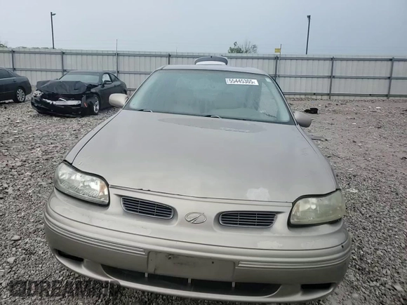 1997 Oldsmobile Cutlass GLS z VIN 1G3NG52MXV6316881, wystawiony jako Copart lot #55445305 z przebiegiem 101 640 mil mil oraz Szkody całkowita. Historia ofert i sprzedaży dostępna na DreamBid. Obrazek 14.