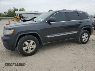 2011 Jeep Grand Cherokee Laredo z VIN 1J4RR4GG8BC540487, wystawiony jako Copart lot #54989705 z przebiegiem 239 319 mil mil oraz Czysty tytuł • Clean title. Historia ofert i sprzedaży dostępna na DreamBid. Obrazek 1.