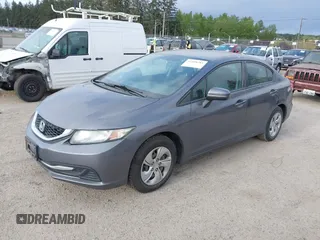 2014 Honda Civic LX with VIN 19XFB2F57EE240843, listed as a IAAI auction lot 42108281 with 255,157 mi miles and . Bid and sale history available at carsss.com. Image 2.