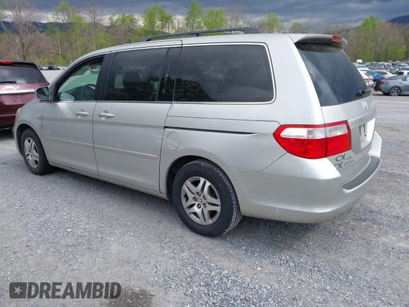 2005 Honda Odyssey EX-L with VIN 5FNRL38795B083325, listed as a IAAI auction lot 42034632 with 183,865 mi miles. Bid and sale history available at carsss.com. Image 3.
