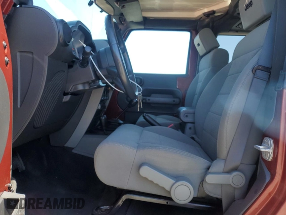 2009 Jeep Wrangler Rubicon with VIN 1J4GA64169L764202, listed as a Copart auction lot 58241585 with 69,189 mi miles and Clean title. Bid and sale history available at DreamBid. Image 7.