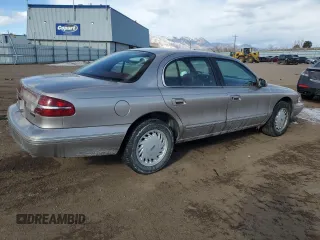 1995 Lincoln Continental with VIN 1LNLM97V4SY691749, listed as a Copart auction lot 41815915 with 69,582 mi miles and Salvage Title. Bid and sale history available at carsss.com. Image 3.