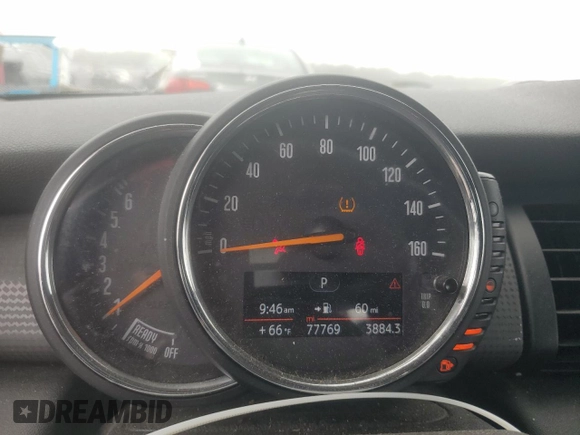 2017 MINI Hardtop Cooper with VIN WMWXP5C55H2D16587, listed as a Copart auction lot 60855195 with 77,769 mi miles and Salvage title. Bid and sale history available at DreamBid. Image 9.