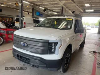 2022 Ford F-150 Lightning Pro with VIN 1FTVW1EL5NWG11725, listed as a IAAI auction lot 42832825 with 5,044 mi miles and . Bid and sale history available at DreamBid. Image 8.