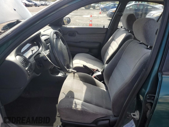 1996 Chevrolet Prizm with VIN 1Y1SK5285TZ058572, listed as a Copart auction lot 51303845 with 87,109 mi miles and Salvage title. Bid and sale history available at DreamBid. Image 7.