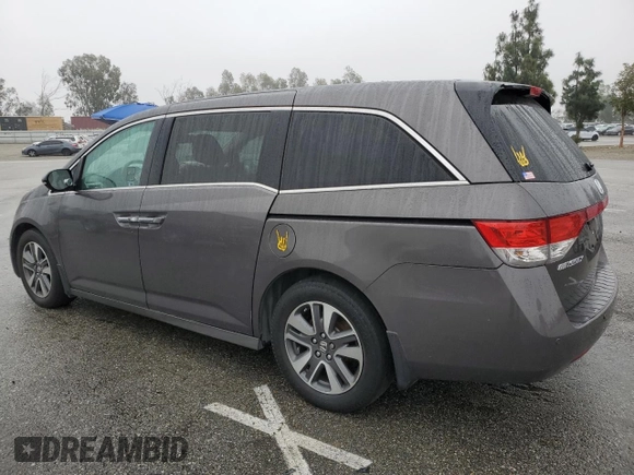 2016 Honda Odyssey Touring Elite with VIN 5FNRL5H97GB090094, listed as a Copart auction lot 50545285 with 158,334 mi miles and Salvage Title. Bid and sale history available at DreamBid. Image 2.