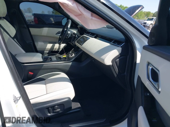 2020 Land Rover Range Rover Velar R-Dynamic S z VIN SALYK2EX4LA272072, wystawiony jako IAAI lot #41910957 z przebiegiem 63 823 mil mil oraz . Historia ofert i sprzedaży dostępna na DreamBid. Obrazek 5.