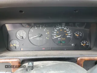 1996 Jeep Grand Cherokee Laredo with VIN 1J4GZ58S7TC403946, listed as a Copart auction lot 71785734 with 231,780 mi miles and Salvage Title. Bid and sale history available at carsss.com. Image 9.