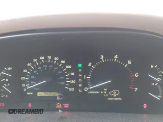 1999 Lexus LX 470 z VIN JT6HT00W8X0045705, wystawiony jako IAAI lot #42005587 z przebiegiem 443 758 mil mil oraz . Historia ofert i sprzedaży dostępna na DreamBid. Obrazek 7.