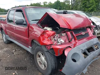 2004 Ford Explorer Sport Trac XLS z VIN 1FMZU77K84UB72038, wystawiony jako IAAI lot #42359818 z przebiegiem 146 619 mil mil oraz . Historia ofert i sprzedaży dostępna na DreamBid. Obrazek 1.
