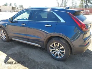2019 Cadillac XT4 FWD Premium Luxury z VIN 1GYFZCR47KF109394, wystawiony jako IAAI lot #41864606 z przebiegiem 98 425 mil mil oraz . Historia ofert i sprzedaży dostępna na DreamBid. Obrazek 3.