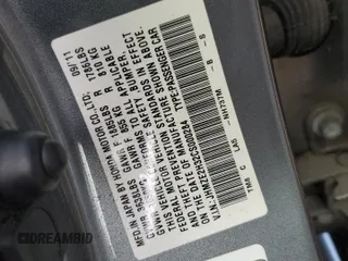 2012 Honda Insight z VIN JHMZE2H32CS000284, wystawiony jako Copart lot #50160335 z przebiegiem 64 074 mil mil oraz Szkoda całkowita • Salvage title. Historia ofert i sprzedaży dostępna na DreamBid. Obrazek 12.