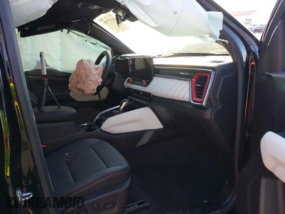 2024 GMC Canyon 4WD AT4X with VIN 1GTP6EEK7R1222174, listed as a IAAI auction lot 41377759 with 2,642 mi miles. Bid and sale history available at carsss.com. Image 5.