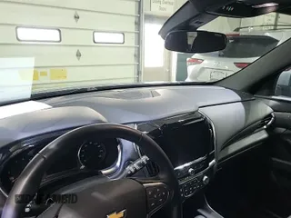 2023 Chevrolet Traverse LT Cloth with VIN 1GNEVGKW6PJ293979, listed as a IAAI auction lot 42088272 with 33,203 mi miles. Bid and sale history available at carsss.com. Image 1.