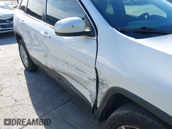 2016 Jeep Cherokee Latitude with VIN 1C4PJLCB9GW149217, listed as a IAAI auction lot 41365164 with 144,702 mi miles. Bid and sale history available at carsss.com. Image 6.