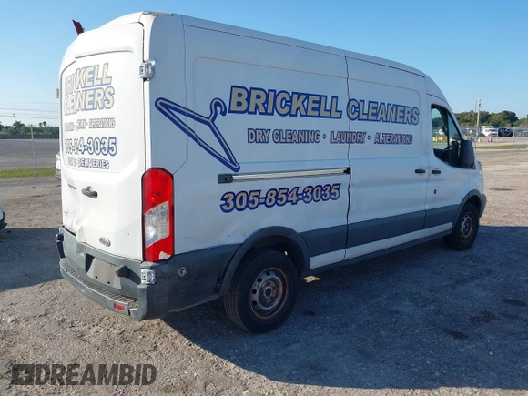 2015 Ford Transit Cargo with VIN 1FTNE2CM9FKA64133, listed as a IAAI auction lot 41312926 with 117,176 mi miles and . Bid and sale history available at carsss.com. Image 4.