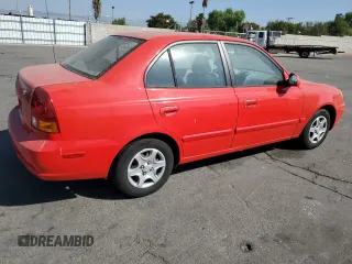 2005 Hyundai Accent GLS with VIN KMHCG45C55U593854, listed as a Copart auction lot 72237914 with 83,203 mi miles and Clean Title. Bid and sale history available at carsss.com. Image 3.