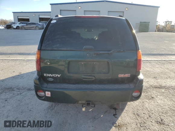 2004 GMC Envoy SLE with VIN 1GKDT13S142197514, listed as a Copart auction lot 89014465 with 202,790 mi miles and Salvage Title. Bid and sale history available at carsss.com. Image 6.