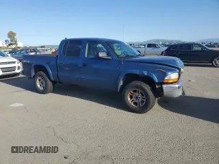 2004 Dodge Dakota SLT with VIN 1D7HG48N04S649545, listed as a Copart auction lot 51510515 with 152,143 mi miles and Salvage Title. Bid and sale history available at carsss.com. Image 4.