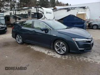 2018 Honda Clarity with VIN JHMZC5F18JC004257, listed as a Copart auction lot 71476912 with 65,805 mi miles. Bid and sale history available at carsss.com. Image 4.