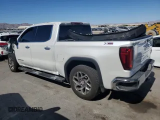 2023 GMC Sierra 1500 SLT z VIN 3GTUUDE83PG267733, wystawiony jako Copart lot #61530004 z przebiegiem 21 446 mil mil oraz Szkoda całkowita • Salvage title. Historia ofert i sprzedaży dostępna na DreamBid. Obrazek 2.
