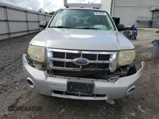 2008 Ford Escape XLS z VIN 1FMCU02Z88KB09430, wystawiony jako Copart lot #58158645 z przebiegiem 216 763 mil mil oraz Czysty tytuł • Clean title. Historia ofert i sprzedaży dostępna na DreamBid. Obrazek 5.