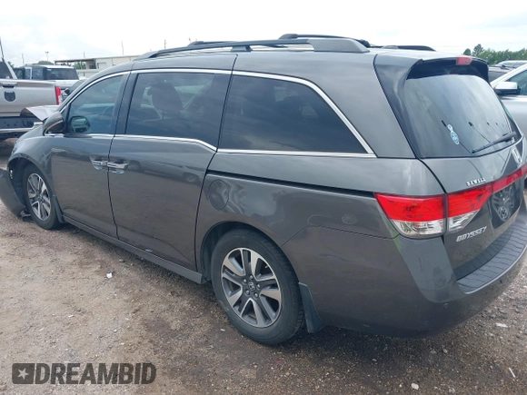 2015 Honda Odyssey Touring Elite with VIN 5FNRL5H99FB089642, listed as a IAAI auction lot 42591786 with 100,755 mi miles and . Bid and sale history available at DreamBid. Image 3.