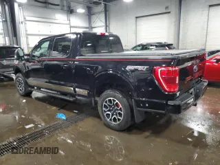 2022 Ford F-150 XL with VIN 1FTFW1E82NFA29355, listed as a Copart auction lot 60212125 with 89,709 mi miles and Salvage title. Bid and sale history available at DreamBid. Image 2.