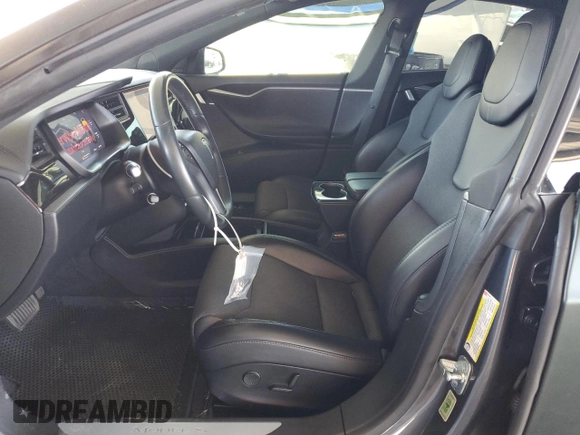 2018 Tesla Model S 75D with VIN 5YJSA1E21JF282786, listed as a Copart auction lot 58058595 with 65,982 mi miles and Salvage title. Bid and sale history available at DreamBid. Image 7.